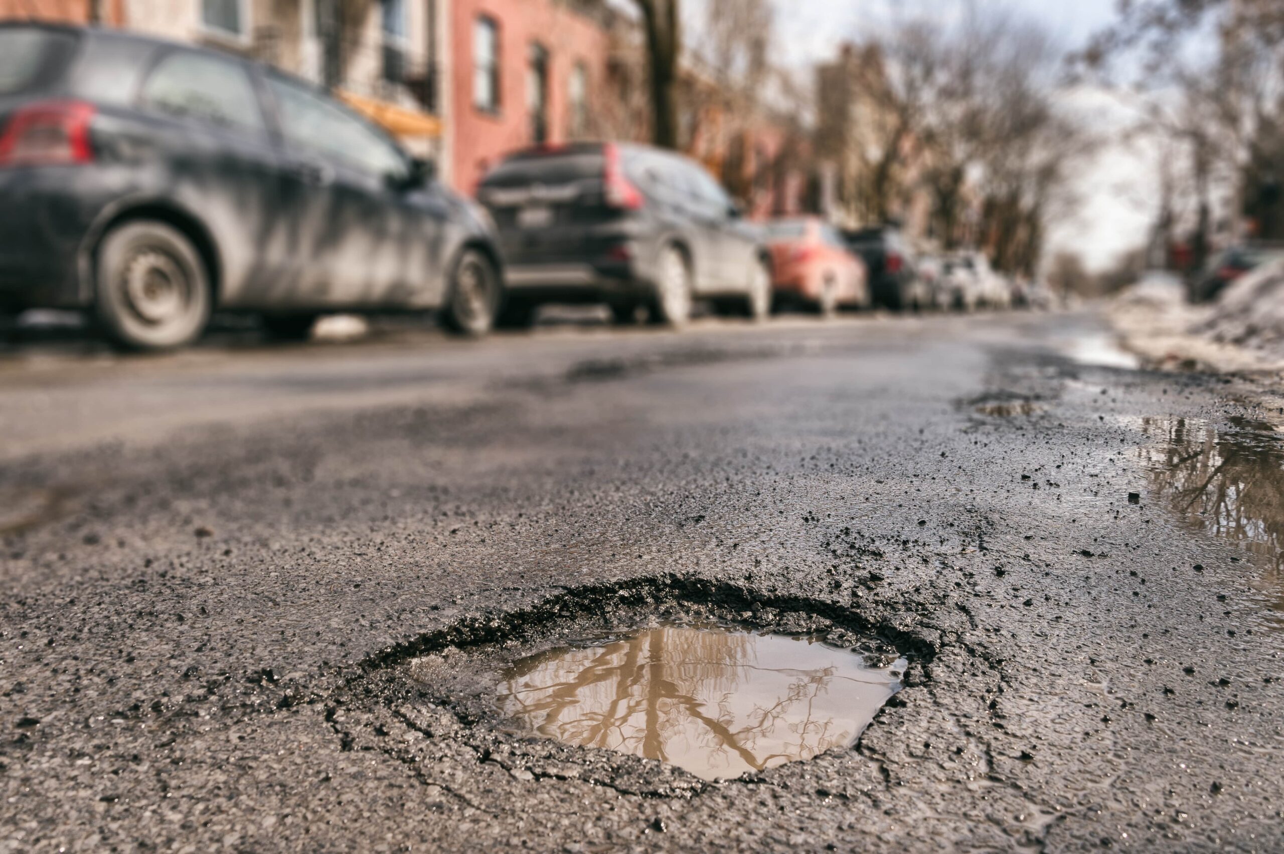 5 Ways Potholes Can Damage Your Car